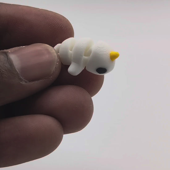 Mini Baby Narwhal — 3D printed mini figure, articulated in hand